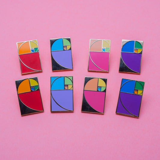 8 pins, each is a rectangle with a fibonacci sequence in the middle made of the colours of the rainbow. 
